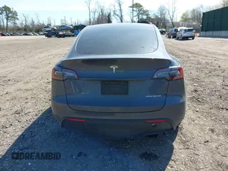 2022 Tesla Model Y Long Range with VIN 7SAYGDEE2NF460945, listed as a IAAI auction lot 41921645 with 62,318 mi miles and . Bid and sale history available at DreamBid. Image 15.