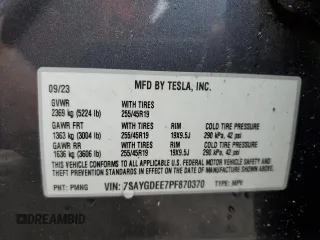 2023 Tesla Model Y Long Range z VIN 7SAYGDEE7PF870370, wystawiony jako Copart lot #55700135 z przebiegiem 32 410 mil mil oraz Szkoda całkowita • Salvage title. Historia ofert i sprzedaży dostępna na DreamBid. Obrazek 12.