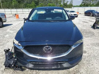 2018 Mazda CX-5 Grand Touring z VIN JM3KFADM5J1420690, wystawiony jako Copart lot #56897875 z przebiegiem 46 483 mil mil oraz Szkoda całkowita • Salvage title. Historia ofert i sprzedaży dostępna na DreamBid. Obrazek 5.
