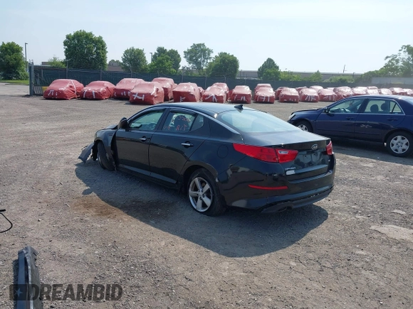 2015 Kia Optima LX with VIN KNAGM4A7XF5653580, listed as a IAAI auction lot 42483072 with 103,589 mi miles and . Bid and sale history available at DreamBid. Image 3.