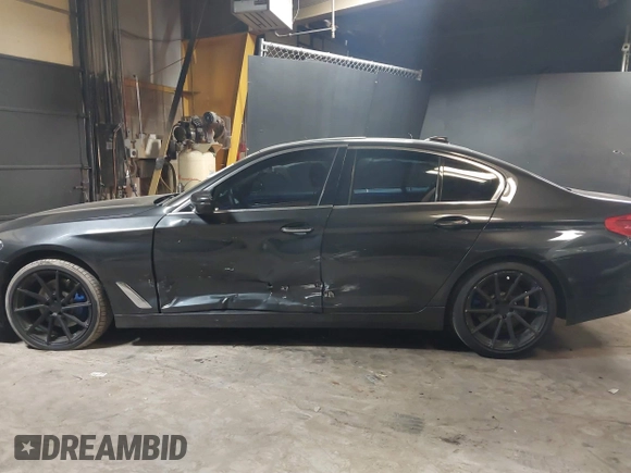 2017 BMW 5 Series 530i xDrive with VIN WBAJA7C35HG905401, listed as a IAAI auction lot 38089618 with 107,692 mi miles and . Bid and sale history available at carsss.com. Image 14.