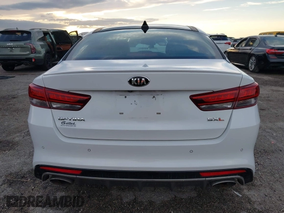 2018 Kia Optima SX with VIN 5XXGV4L21JG182103, listed as a IAAI auction lot 40522762 with 60,542 mi miles and . Bid and sale history available at DreamBid. Image 16.