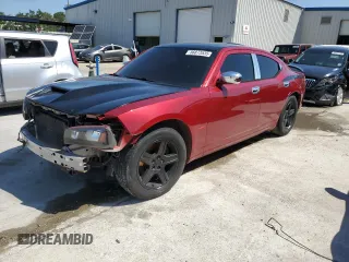 2010 Dodge Charger Police z VIN 2B3AA4CT8AH145848, wystawiony jako Copart lot #56873535 z przebiegiem 188 298 mil mil oraz Szkoda całkowita • Salvage title. Historia ofert i sprzedaży dostępna na DreamBid. Obrazek 1.
