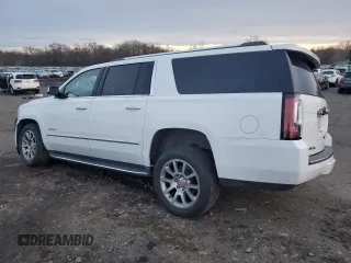 2020 GMC Yukon XL Denali with VIN 1GKS2HKJ1LR299560, listed as a Copart auction lot 84943284 with 99,084 mi miles and Salvage Title. Bid and sale history available at carsss.com. Image 2.