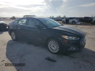 2013 Ford Fusion SE Hybrid с VIN 3FA6P0LU6DR157953, выставлен на аукционе Copart как лот 61175825 с пробегом 125 768 миль миль и Чистый • Clean title. История ставок и продаж доступна на DreamBid. Изображение 4.