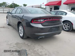 2023 Dodge Charger SXT with VIN 2C3CDXBG2PH530095, listed as a IAAI auction lot 42016658 with 50,528 mi miles and . Bid and sale history available at DreamBid. Image 3.