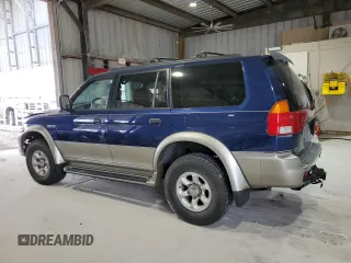 1999 Mitsubishi Montero z VIN JA4MT41R8XP039248, wystawiony jako Copart lot #58486465 z przebiegiem 183 316 mil mil oraz Szkoda całkowita • Salvage title. Historia ofert i sprzedaży dostępna na DreamBid. Obrazek 2.