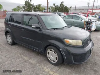 2009 Scion xB with VIN JTLKE50E791068407, listed as a IAAI auction lot 42075744 with 199,789 mi miles. Bid and sale history available at carsss.com. Image 1.