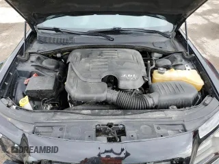 2014 Chrysler 300 S z VIN 2C3CCAGG1EH297607, wystawiony jako Copart lot #56889285 z przebiegiem 136 485 mil mil oraz Szkoda całkowita • Salvage title. Historia ofert i sprzedaży dostępna na DreamBid. Obrazek 11.