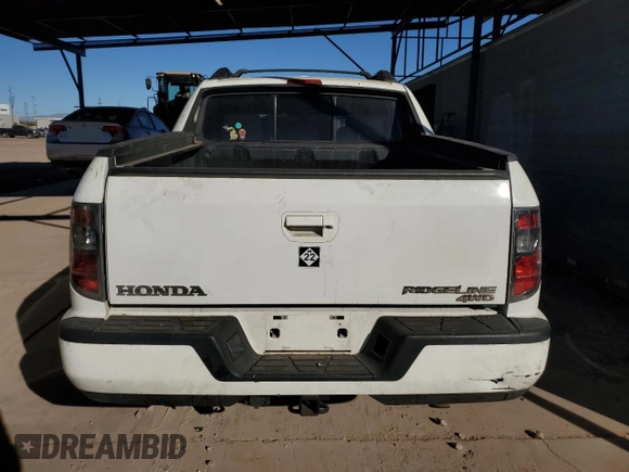2014 Honda Ridgeline RTL z VIN 5FPYK1F51EB011627, wystawiony jako Copart lot #88334645 z przebiegiem 137 494 mil mil oraz Szkoda całkowita • Salvage title. Historia ofert i sprzedaży dostępna na DreamBid. Obrazek 6.