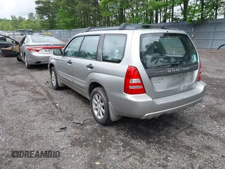 2005 Subaru Forester XS with VIN JF1SG65605H745494, listed as a IAAI auction lot 42382364 with 256,505 mi miles and . Bid and sale history available at DreamBid. Image 3.