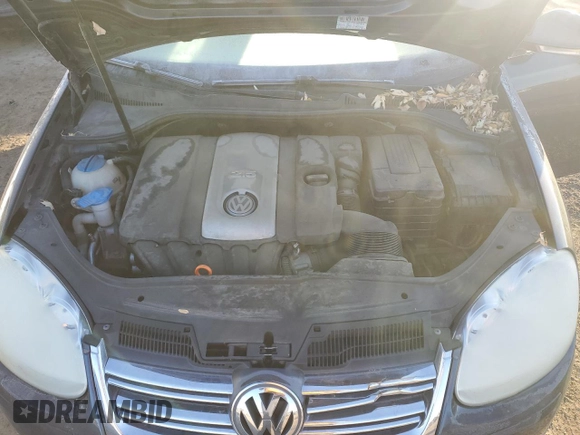 2009 Volkswagen Jetta z VIN 3VWTM81K89M264428, wystawiony jako Copart lot #81252684 z przebiegiem 37 664 mil mil oraz Czysty tytuł • Clean title. Historia ofert i sprzedaży dostępna na DreamBid. Obrazek 11.