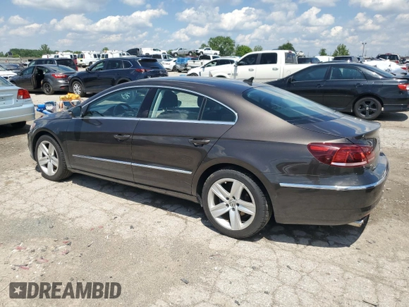 2013 Volkswagen CC R-Line with VIN WVWBP7AN8DE570229, listed as a Copart auction lot 58868614 with 92,166 mi miles and Salvage Title. Bid and sale history available at carsss.com. Image 2.