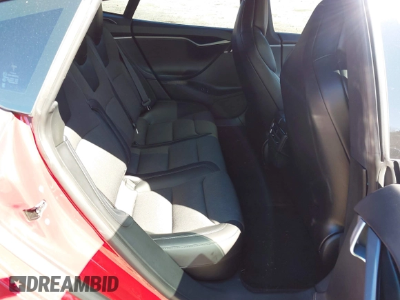2018 Tesla Model S 75D with VIN 5YJSA1E2XJF295777, listed as a IAAI auction lot 41694540 with 70,428 mi miles and . Bid and sale history available at DreamBid. Image 8.