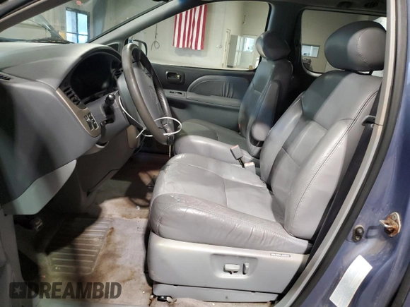 2002 Toyota Sienna LE with VIN 4T3ZF13C42U437712, listed as a Copart auction lot 64836245 with 151,693 mi miles and Salvage title. Bid and sale history available at DreamBid. Image 7.