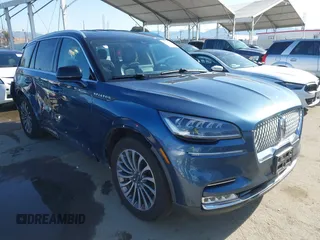 2020 Lincoln Aviator Reserve z VIN 5LM5J7WC7LGL17162, wystawiony jako IAAI lot #41954357 z przebiegiem 59 325 mil mil oraz . Historia ofert i sprzedaży dostępna na DreamBid. Obrazek 1.