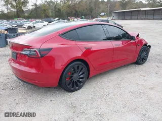 2022 Tesla Model 3 Performance with VIN 5YJ3E1ECXNF326159, listed as a IAAI auction lot 40796573 with 43,512 mi miles. Bid and sale history available at carsss.com. Image 4.