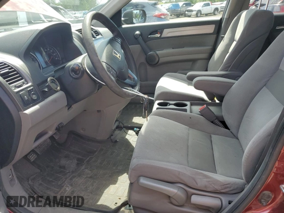 2011 Honda CR-V SE z VIN JHLRE4H46BC024315, wystawiony jako Copart lot #55491055 z przebiegiem 145 577 mil mil oraz Szkoda całkowita • Salvage title. Historia ofert i sprzedaży dostępna na DreamBid. Obrazek 7.