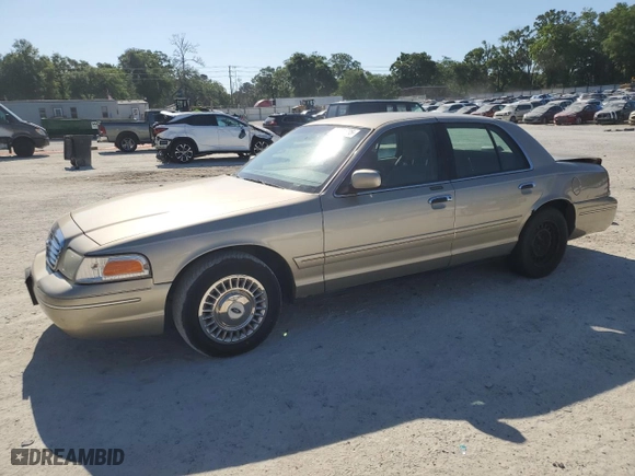 2000 Ford Crown Victoria with VIN 2FAFP73W4YX216080, listed as a Copart auction lot 53774835 with 144,404 mi miles and Salvage Title. Bid and sale history available at carsss.com. Image 1.