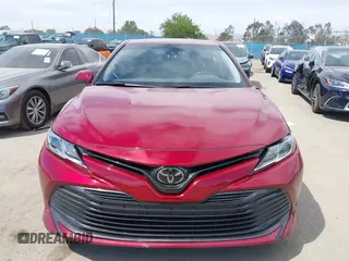 2020 Toyota Camry LE with VIN 4T1C11AK9LU991305, listed as a IAAI auction lot 41976371 with 57,422 mi miles and . Bid and sale history available at carsss.com. Image 12.