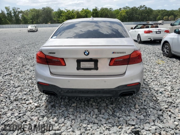 2019 BMW 5 Series M550i xDrive with VIN WBAJB9C53KB464902, listed as a Copart auction lot 54252875 with 45,157 mi miles and Salvage title. Bid and sale history available at DreamBid. Image 6.