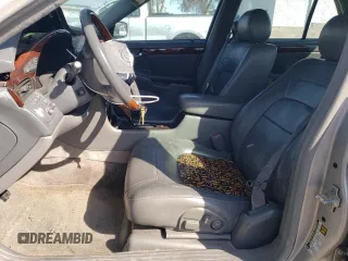 2004 Cadillac DeVille DTS z VIN 1G6KF57994U203706, wystawiony jako Copart lot #76278324 z przebiegiem 203 709 mil mil oraz Szkoda całkowita • Salvage title. Historia ofert i sprzedaży dostępna na DreamBid. Obrazek 7.