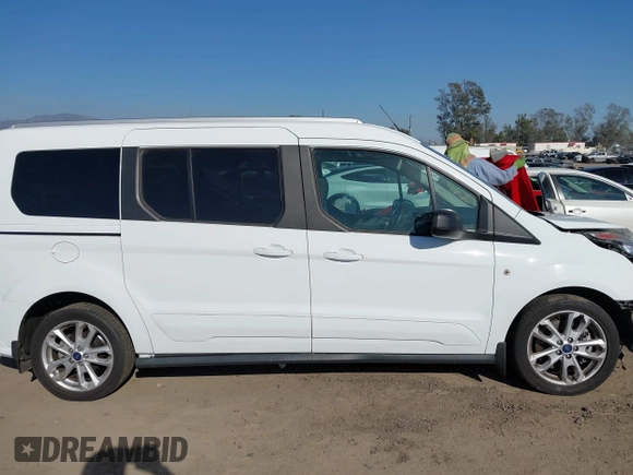 2017 Ford Transit Connect XLT z VIN NM0GE9F73H1336222, wystawiony jako IAAI lot #41856988 z przebiegiem 38 501 mil mil oraz . Historia ofert i sprzedaży dostępna na DreamBid. Obrazek 13.
