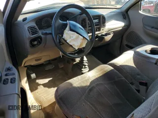 2000 Ford F-150 XL with VIN 1FTRF18W0YNB59622, listed as a Copart auction lot 50178485 with 264,057 mi miles and Salvage title. Bid and sale history available at DreamBid. Image 8.