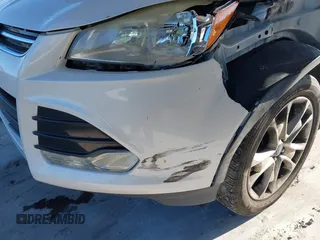 2015 Ford Escape Titanium with VIN 1FMCU0J96FUA48615, listed as a IAAI auction lot 39482355 with 186,340 mi miles and . Bid and sale history available at DreamBid. Image 12.