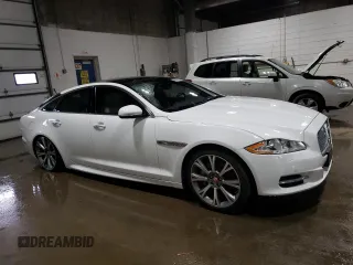 2015 Jaguar XJ with VIN SAJWJ1CD3F8V89374, listed as a Copart auction lot 49416114 with 94,636 mi miles and . Bid and sale history available at DreamBid. Image 4.