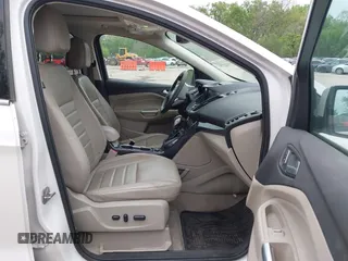 2016 Ford Escape Titanium with VIN 1FMCU9J96GUB97564, listed as a IAAI auction lot 42137663 with 269,009 mi miles. Bid and sale history available at carsss.com. Image 5.