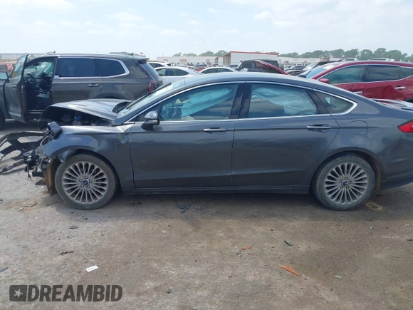2016 Ford Fusion Titanium with VIN 3FA6P0K97GR217062, listed as a IAAI auction lot 42044943 with Not Provided miles and . Bid and sale history available at carsss.com. Image 15.