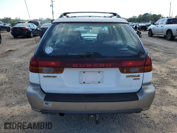 1999 Subaru Legacy Outback with VIN 4S3BG6850X7649578, listed as a Copart auction lot 56654155 with 174,651 mi miles and Salvage title. Bid and sale history available at DreamBid. Image 6.
