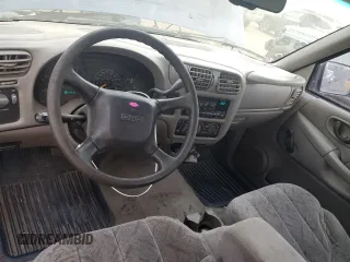 2000 GMC Sonoma SLS w/1SF Pkg with VIN 1GTCS1959Y8212162, listed as a Copart auction lot 82129784 with 149,063 mi miles and Salvage Title. Bid and sale history available at carsss.com. Image 8.