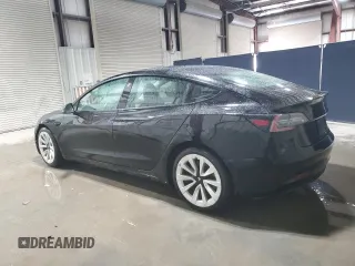 2023 Tesla Model 3 z VIN 5YJ3E1EA1PF452122, wystawiony jako Copart lot #63576995 z przebiegiem 104 907 mil mil oraz Czysty tytuł • Clean title. Historia ofert i sprzedaży dostępna na DreamBid. Obrazek 2.