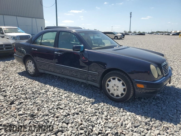 1998 Mercedes-Benz E with VIN WDBJF82F4WX012153, listed as a Copart auction lot 51848665 with 121,867 mi miles and Salvage Title. Bid and sale history available at DreamBid. Image 4.