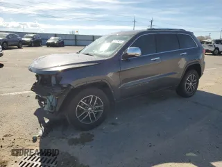 2018 Jeep Grand Cherokee Limited с VIN 1C4RJFBGXJC394902, выставлен на аукционе Copart как лот 50313415 с пробегом 63 233 миль миль и Списание • Salvage title. История ставок и продаж доступна на DreamBid. Изображение 1.