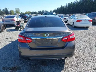 2017 Nissan Altima 2.5 SR with VIN 1N4AL3AP8HC180059, listed as a IAAI auction lot 42075133 with 197,955 mi miles. Bid and sale history available at carsss.com. Image 16.