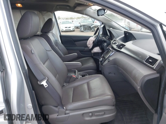 2014 Honda Odyssey Touring with VIN 5FNRL5H93EB066162, listed as a IAAI auction lot 41734783 with 173,063 mi miles and . Bid and sale history available at DreamBid. Image 5.