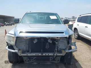 2016 Toyota Tundra SR z VIN 5TFRM5F1XGX099453, wystawiony jako IAAI lot #42492840 z przebiegiem 54 060 mil mil oraz . Historia ofert i sprzedaży dostępna na DreamBid. Obrazek 13.