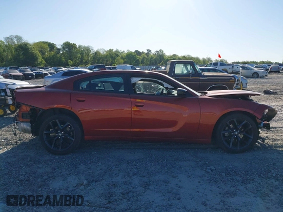 2023 Dodge Charger SXT z VIN 2C3CDXBG5PH511802, wystawiony jako IAAI lot #42039397 z przebiegiem 20 910 mil mil oraz . Historia ofert i sprzedaży dostępna na DreamBid. Obrazek 12.