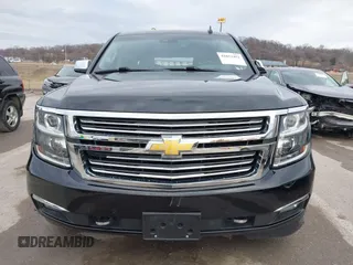 2019 Chevrolet Suburban Premier with VIN 1GNSKJKC7KR261826, listed as a IAAI auction lot 41652451 with 127,032 mi miles and . Bid and sale history available at DreamBid. Image 12.