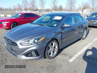 2018 Hyundai Sonata SEL with VIN 5NPE34AFXJH718120, listed as a IAAI auction lot 41847879 with 84,408 mi miles and . Bid and sale history available at carsss.com. Image 2.