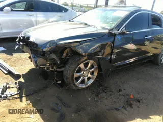 2015 Cadillac ATS Sedan Luxury RWD with VIN 1G6AB5RX5F0101834, listed as a IAAI auction lot 37302564 with 107,046 mi miles. Bid and sale history available at carsss.com. Image 6.