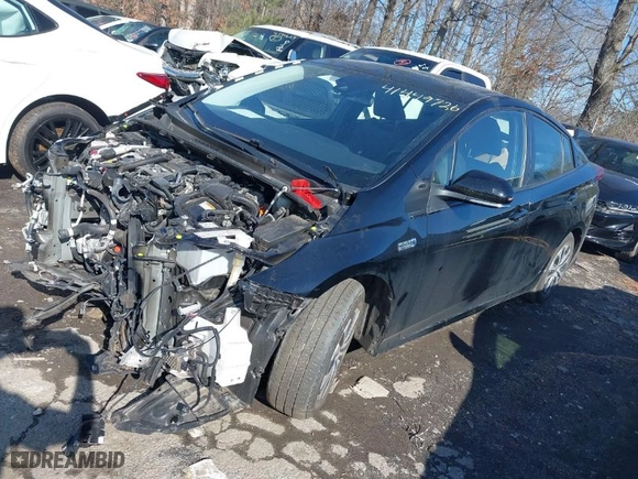 2021 Toyota Prius Prime LE with VIN JTDKAMFP6M3174161, listed as a IAAI auction lot 41449726 with 20,667 mi miles. Bid and sale history available at carsss.com. Image 2.
