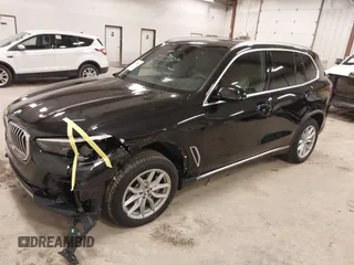 2023 BMW X5 xDrive40i with VIN 5UXCR6C08P9R88991, listed as a IAAI auction lot 41965881 with 33,136 mi miles. Bid and sale history available at carsss.com. Image 2.