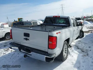 2018 Chevrolet Silverado 1500 LT with VIN 1GCVKREC7JZ173079, listed as a IAAI auction lot 41602728 with 147,685 mi miles. Bid and sale history available at carsss.com. Image 4.