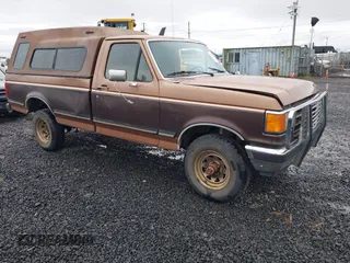 1990 Ford F-150 with VIN 2FTEF14Y1LCA00886, listed as a IAAI auction lot 41774272 with 17,872 mi miles. Bid and sale history available at carsss.com. Image 1.
