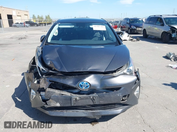 2016 Toyota Prius Four z VIN JTDKARFUXG3019426, wystawiony jako IAAI lot #42385785 z przebiegiem 94 838 mil mil oraz . Historia ofert i sprzedaży dostępna na DreamBid. Obrazek 12.