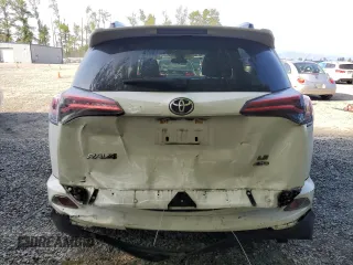 2018 Toyota RAV4 LE with VIN JTMBFREV2JJ250335, listed as a Copart auction lot 54396645 with 68,428 mi miles and Salvage Title. Bid and sale history available at carsss.com. Image 6.